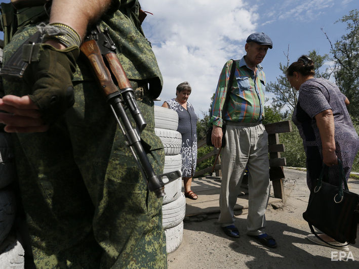 На участке разведения в Станице Луганской находятся переодетые в гражданскую одежду российско-оккупационные войска – украинская разведка