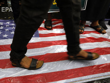 ﻿Після вбивства іранського генерала Сулеймані на Близькому Сході почалися антиамериканські протести. Фоторепортаж