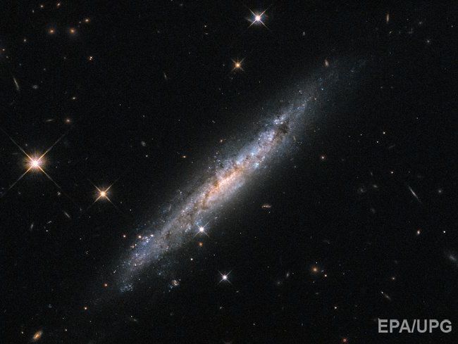 Телескоп Hubble сфотографировал "спокойную" галактику со "взрывоопасными тенденциями"