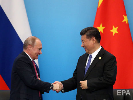 Си Цзиньпин подарил Путину статуэтку с лицом российского лидера